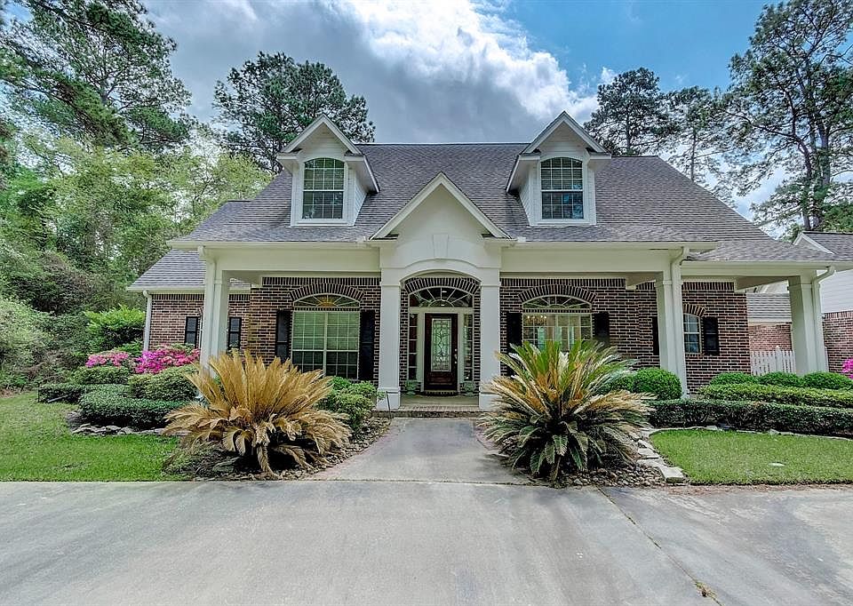 Beautifully maintained home on 11+ acres located in Indigo Lake Estates, an equestrian and private ski lake community.