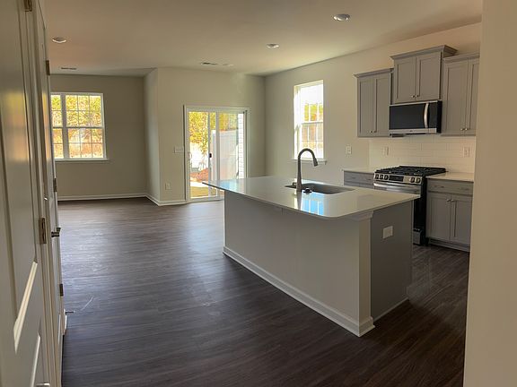 LVP flooring all downstairs, quartz top, all appliances included