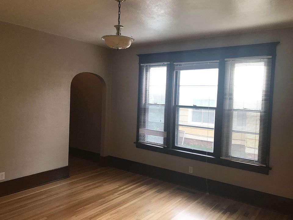 Living room. (Photo is of a mirror-image apartment.)