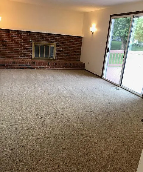 Family room with wood burning fireplace