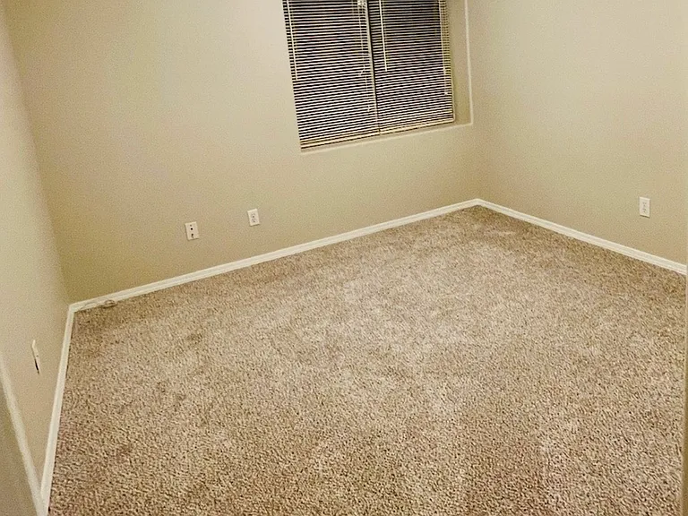 Basement full bedroom actual photo.
