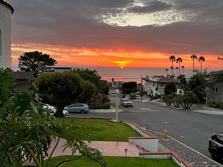 catch the amazing sun setting on your front deck