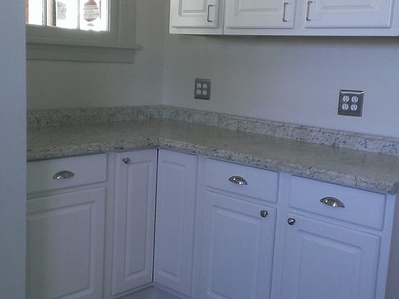 All new cabinets, counter tops and pergo wood flooring