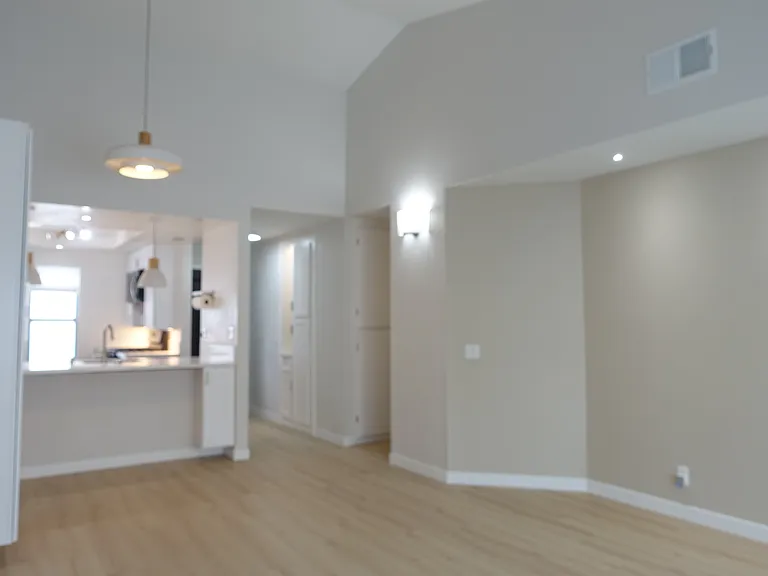 Lighting: White Oak chandelier and pendant lights. Wall sconces and recessed lights