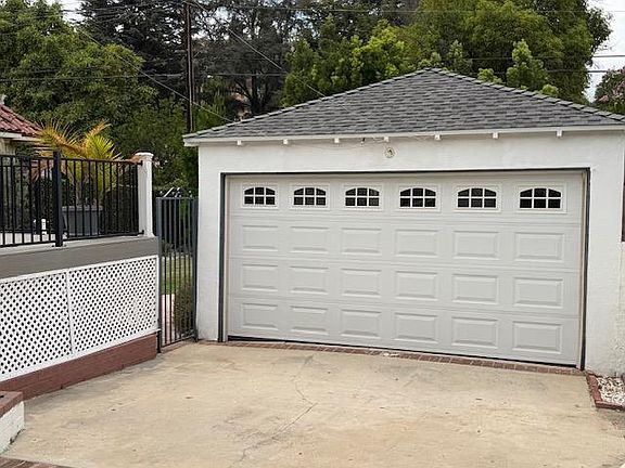 Two car garage with auto garage door.