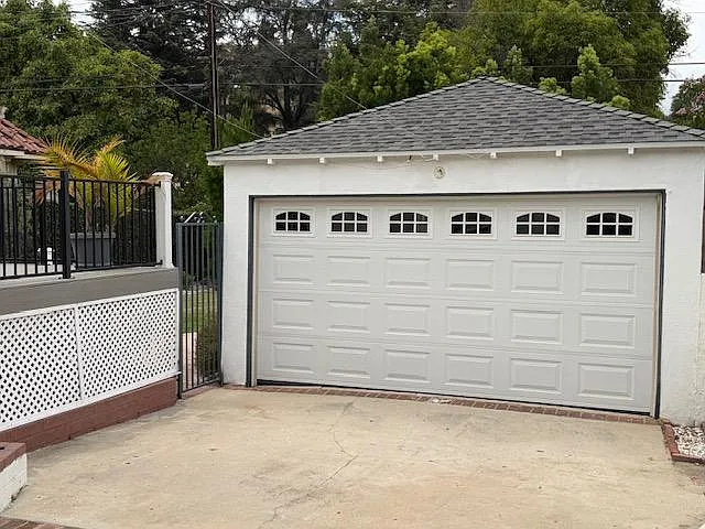 Two car garage with auto garage door.
