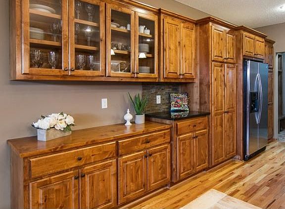 Custom built in buffet made with knotty alder cabinets.