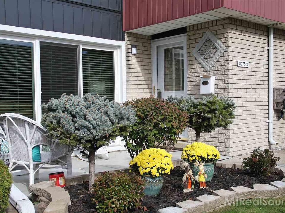 Patio seating area overlooking courtyard