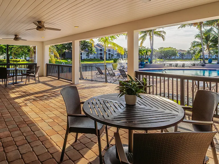 Enjoy shaded, breezy comfort at the poolside patio.