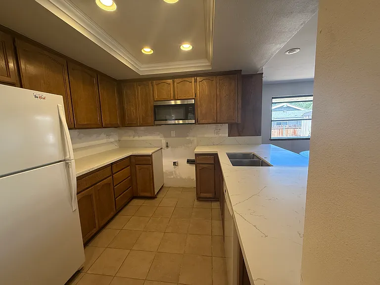 Kitchen, new counters (stove will be back in once counters are done)
