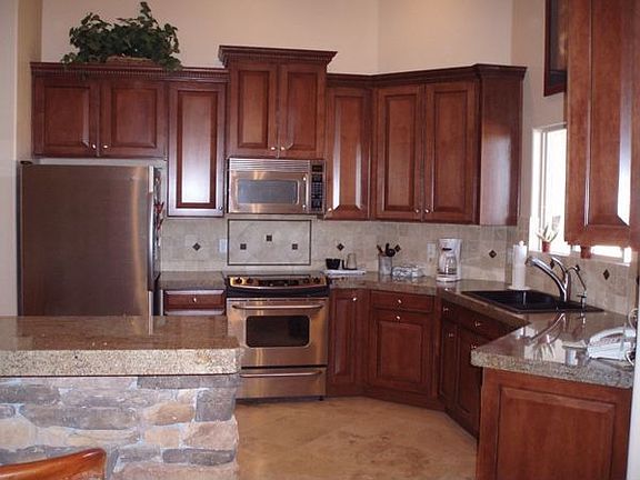 Stunning Kitchen with Granite and Stone!