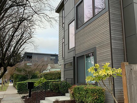 Stand alone house, shared driveway.
Nice level sidewalk out front. Easy walk to stores etc.