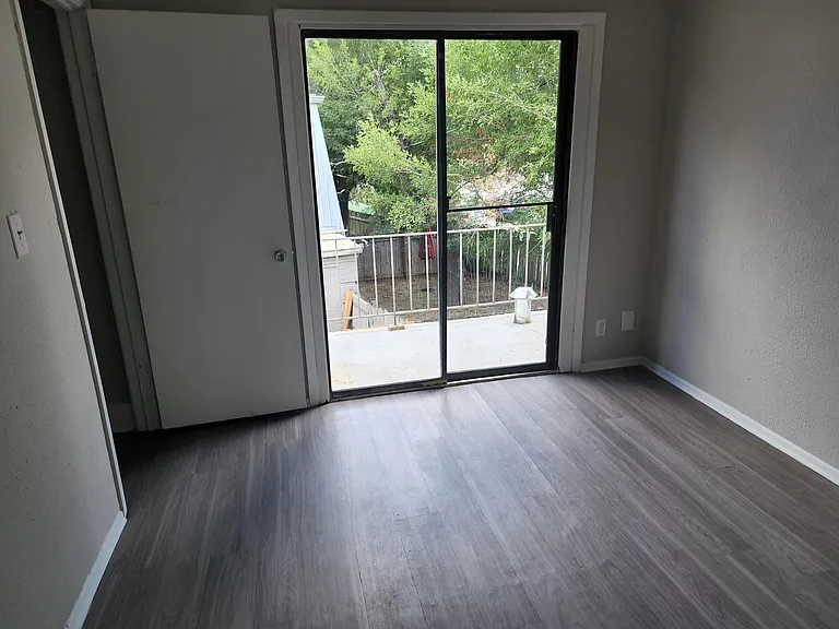 2nd floor - master bedroom with small patio space