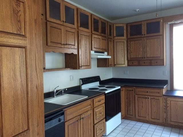 Kitchen - includes dishwasher, stove, and refrigerator