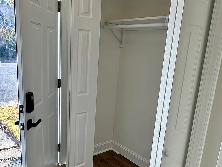 Large entry closet right inside the front door_designed for convenience with ample space for coats, boots, hats, and umbrellas to keep your home organized year-round.