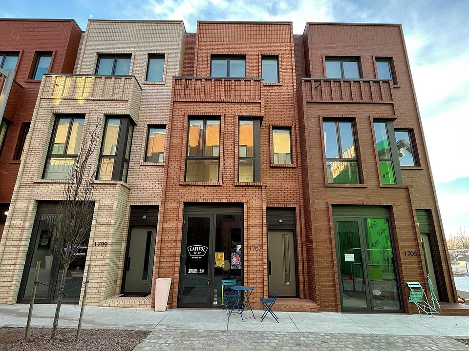 1707 Spoke St - 1st Floor Capitol Co-Op Bicycle Shop. 2nd/3rd floor single residential unit with 2 BR, 1.5 bath, dedicated entrances off front and back and back privacy deck with views to the north.