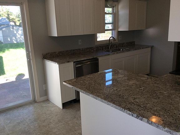 Patio off kitchen is ideal for summer grilling