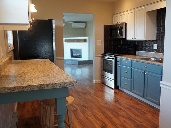 Eat-in kitchen with all stainless steel appliances included