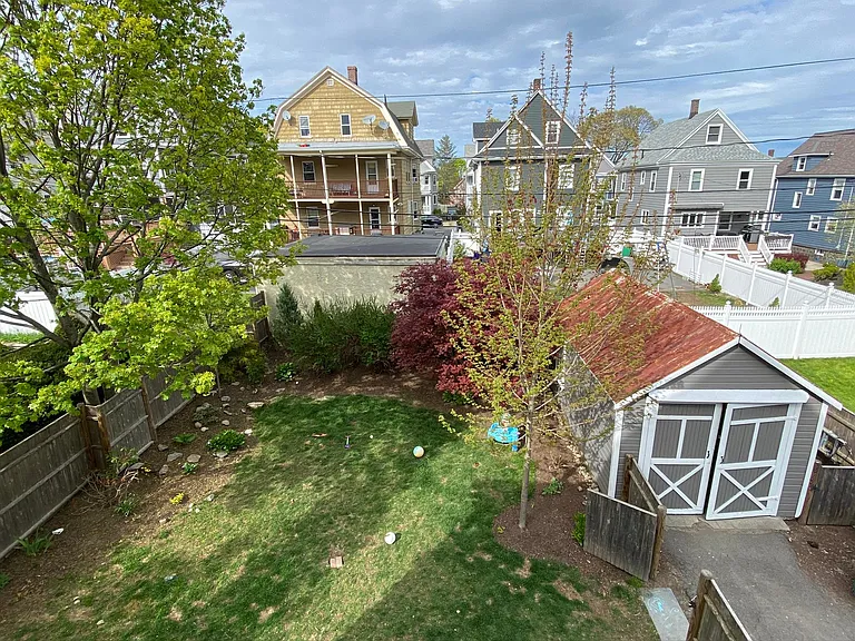 fenced in yard, shared garage storage