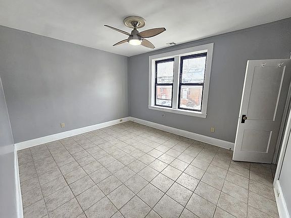 Living room and coat closet.