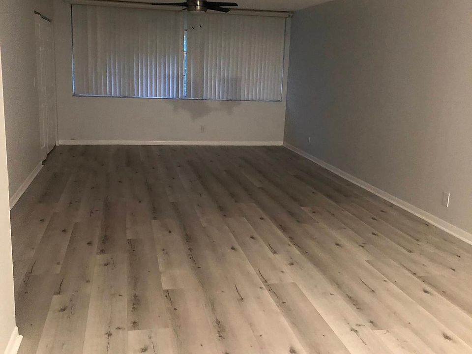 Open living area as you enter condo.