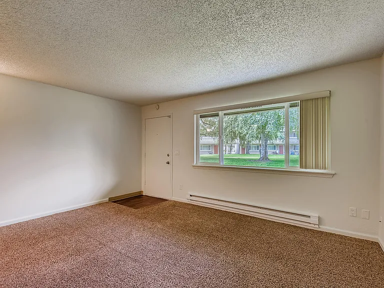The Living Room in a One Bedroom Apartment at Morningtree Park Apartments