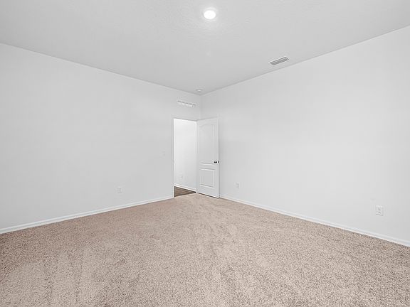 The master bathroom has a walk-in closet