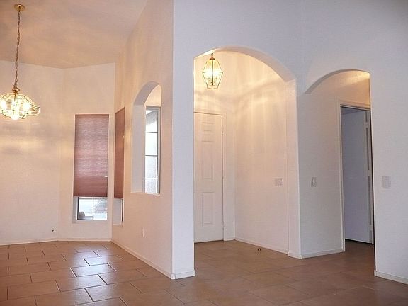 Elegant entry-way--cathedral ceilings, attractive tiled floors