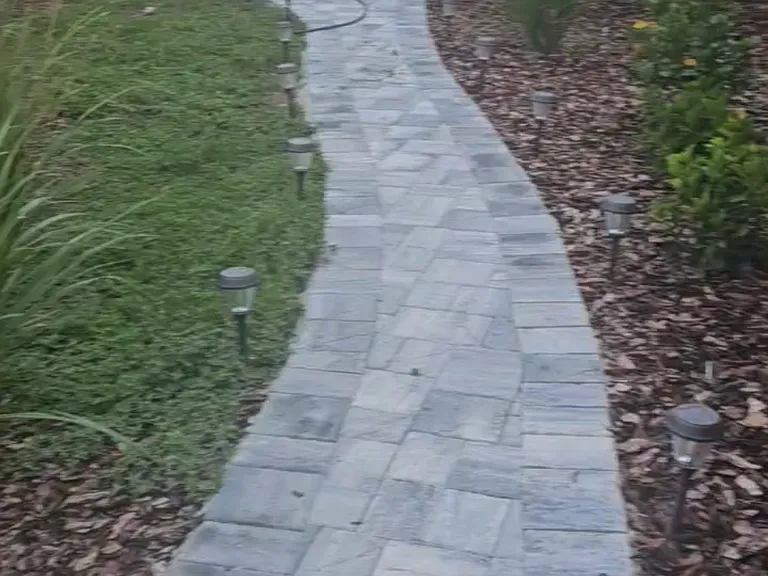 This is the pathway from the two off-street parking places towards the kitchen doot