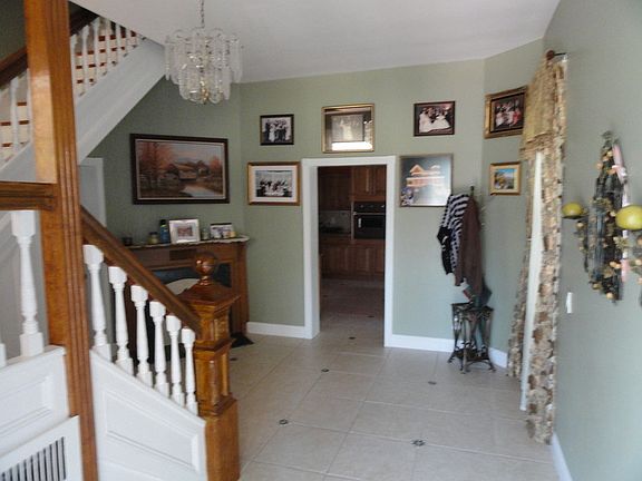 Foyer
						:
						Imported Porcelain Tile