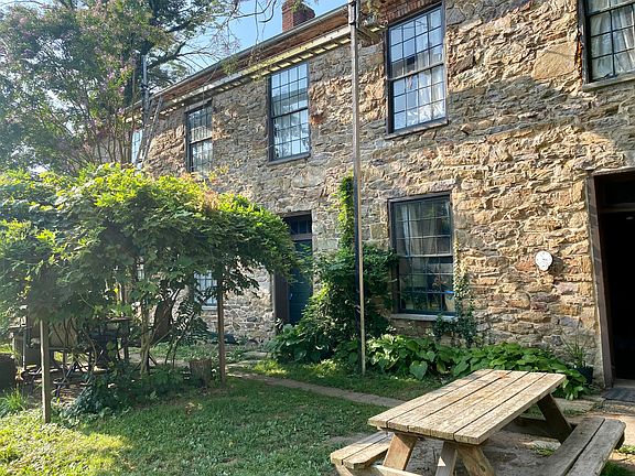 Large Old Academy Converted into an apartment on one side: Upstairs
2 Bedrooms, Open Office/Yoga Area 
1 Large Bathroom with New Washer & Dryer. Furniture included