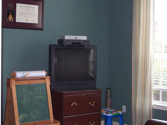 Study with French doors, can be used for playroom, hobby room, etc.