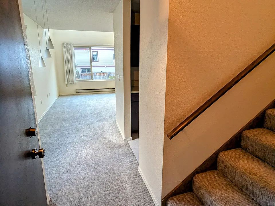 Entry with stairs to top floor bedroom