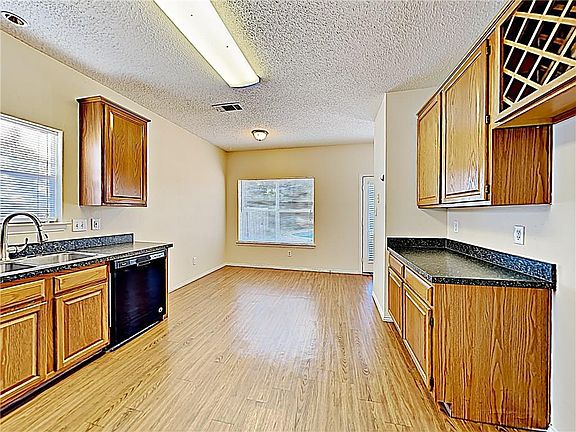 4th image of 8013 Alamo Ct