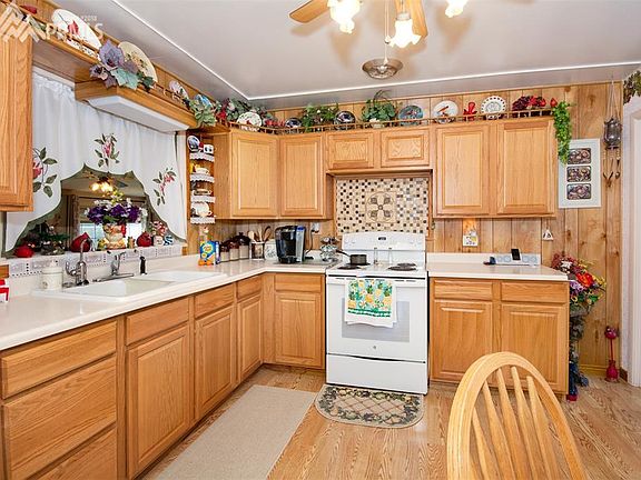 Updated Kitchen With NEWER Cabinets And Flooring