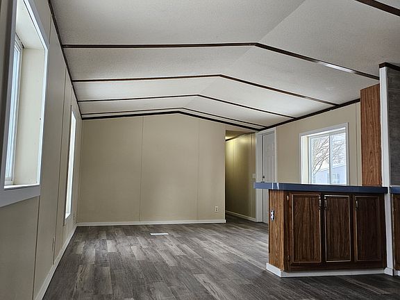 Kitchen leading into living room.