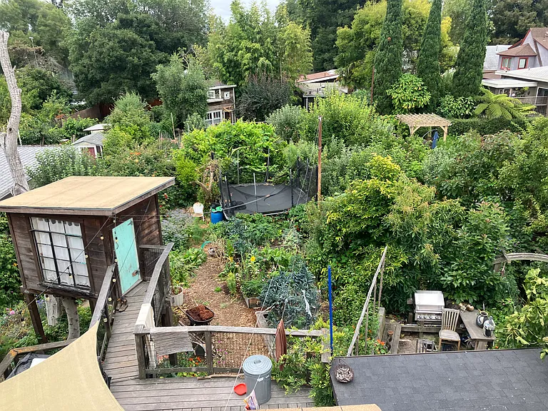 This is the view out the hangout space. Thats our yard. You are free to use the BBQ space pictured in the backyard