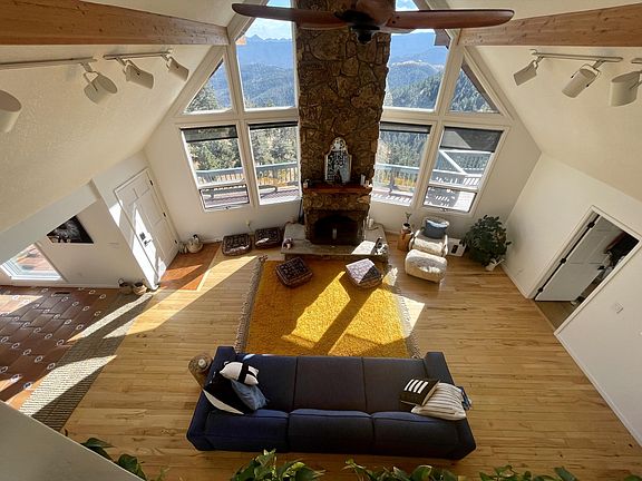 Upstairs living with fire place and sweeping views all the way to Denver and beyond.