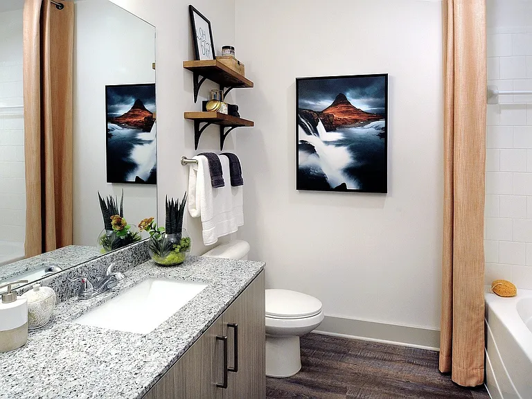 Garden soaking tub and plentiful storage in bathrooms