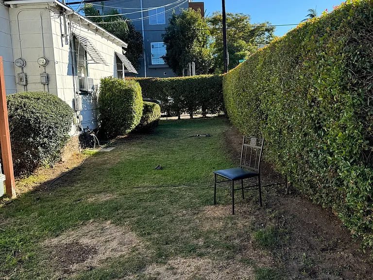Sitting area and yard extending to front house