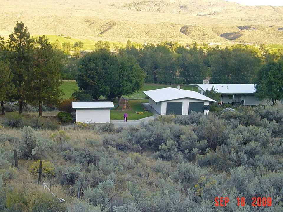 View of the house from the hills behind