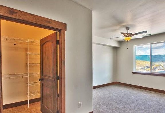 Walk-in closets include shelving.