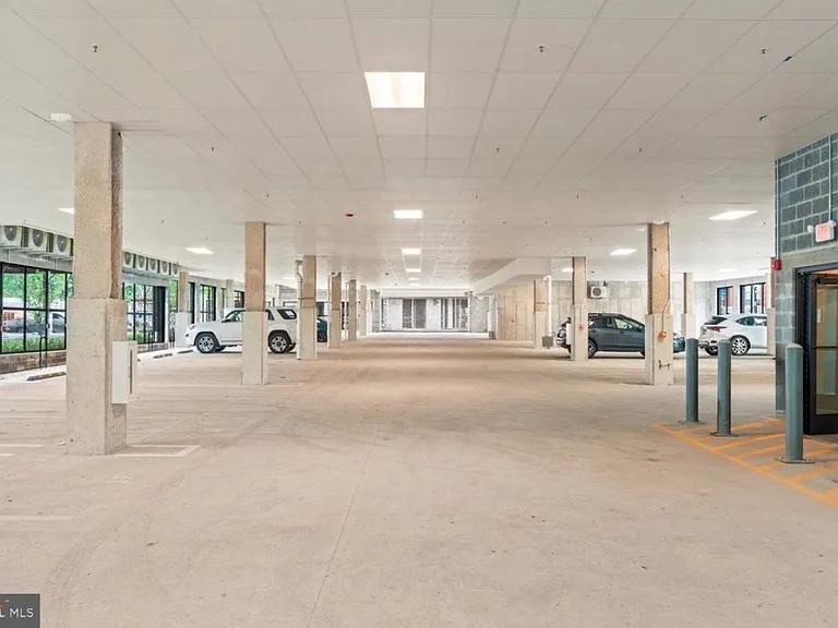 Garage with 2 Tandem EV Charge Accessible Parking Spots