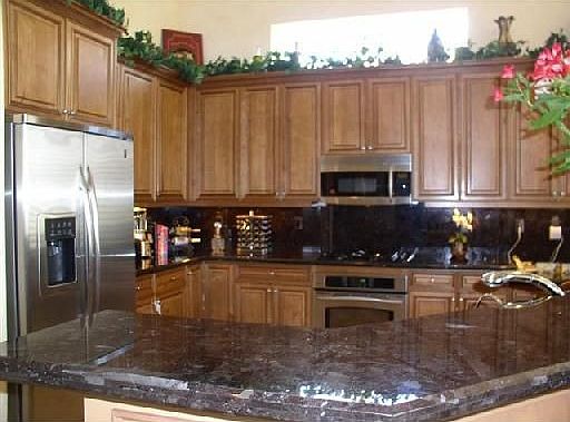 Kitchen w/42" Wood Cabinetry, Granite Counter Tops, Wine Rack