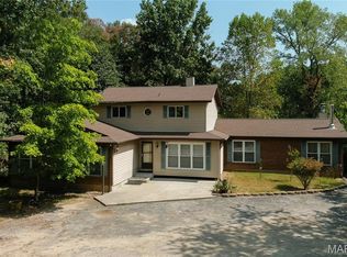 2880 Camelot St, High Ridge, MO 63049