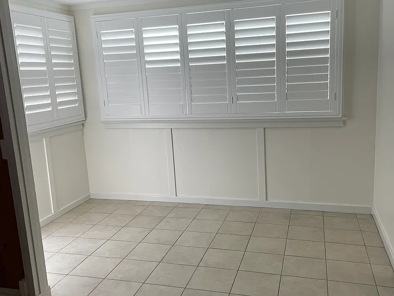 Front door (shown) and rear door.
New Plantation Shutters throughout and recessed lighting
Room for daybed or office