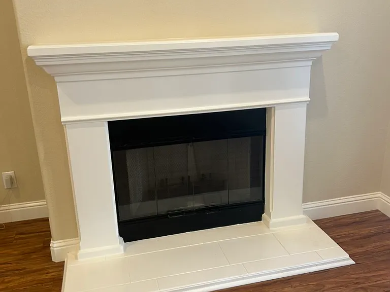 Family Room with fireplace, freshly painted interiors