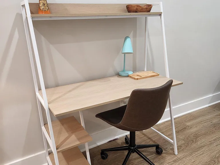 Computer desk-work space. Additional modification can be made to unit if requested to accommodate work or other needs.