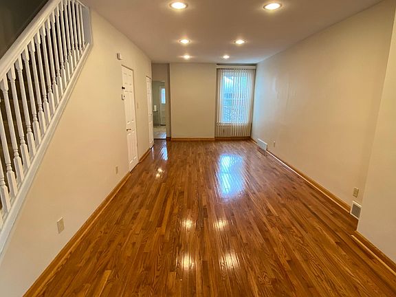 Main level : Open Living and Dining rooms with hardwood floors