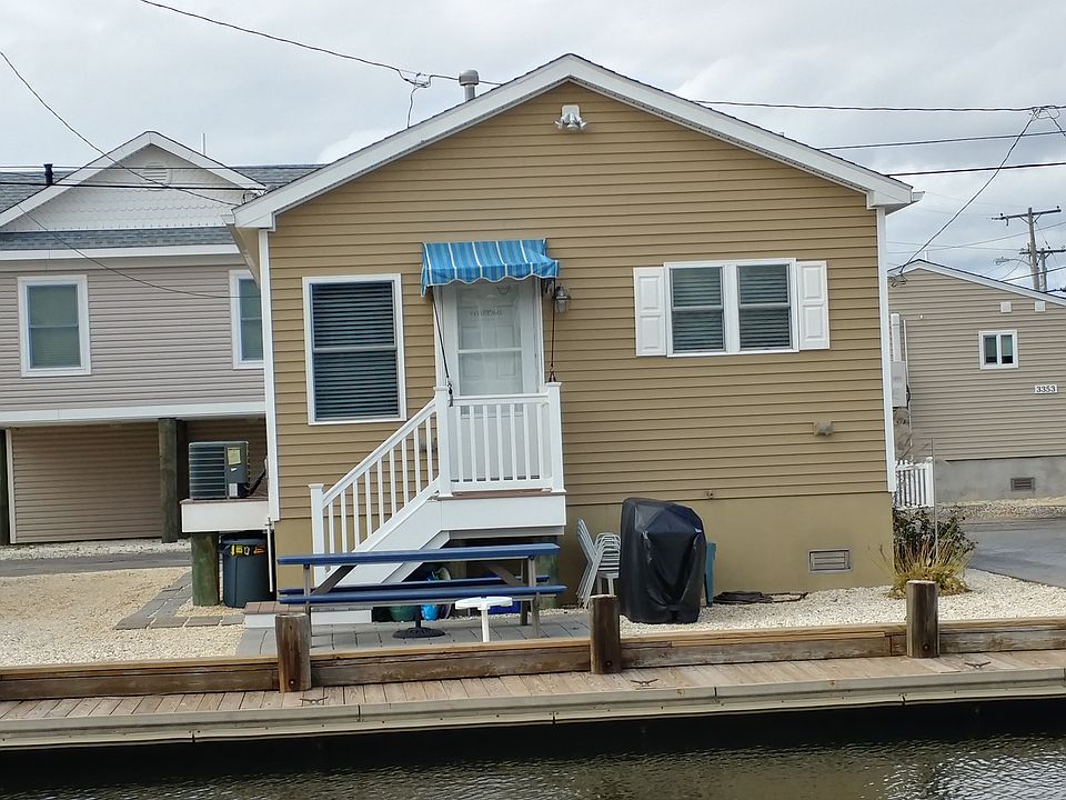 Front of house w/ Dock